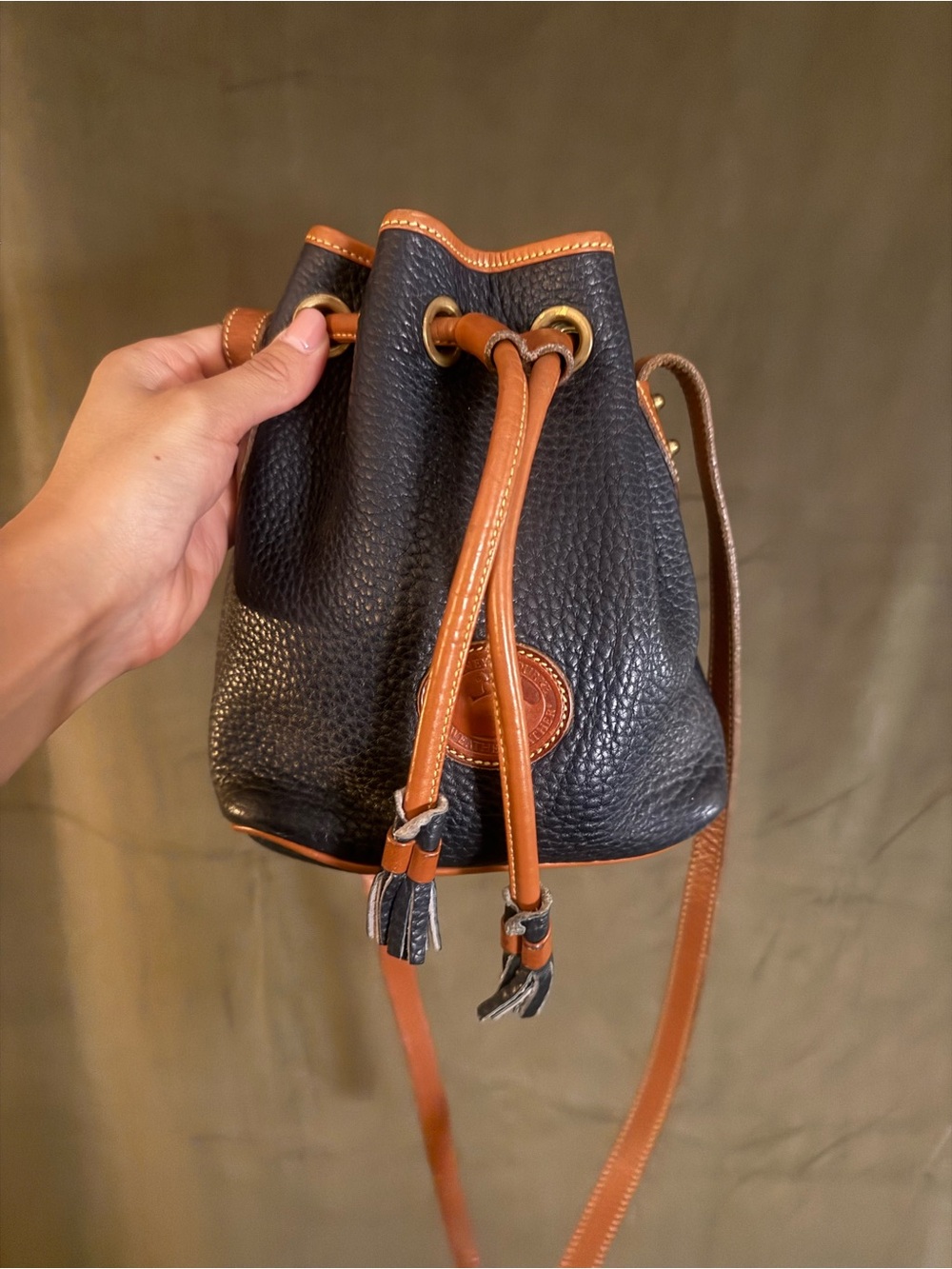 Vintage Dooney & Bourke Navy Pebble Leather Drawstring Crossbody with Tan Trim
